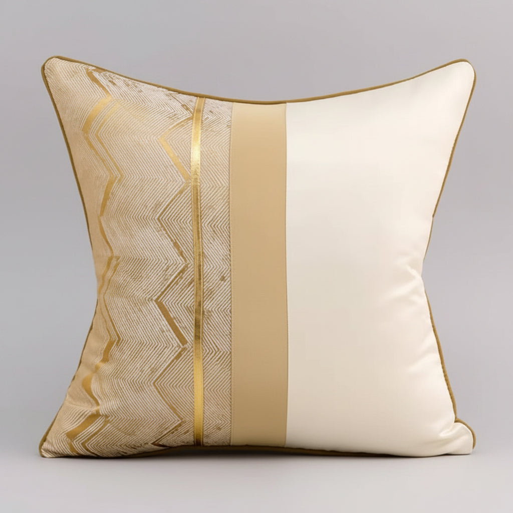 Decorative pillow with gold geometric pattern on a beige background