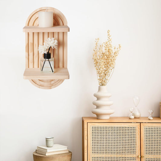 Wooden wall sconce with decorative items on a white wall